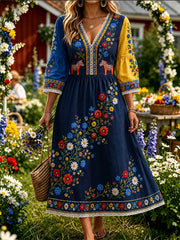 Damklänning i vintagestil med svensk dalahäst, broderad blomsterkonst och avslappnad passform