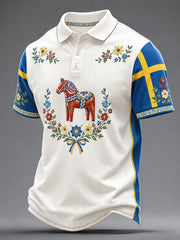 Herrpolotröja med konsttryck till minne av svenska högtider och festivaler, kortärmad