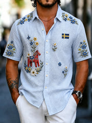 Herrfestskjorta för midsommar i vafeltyg med trädruskemotiv och blommig brodyr, kortärmad
